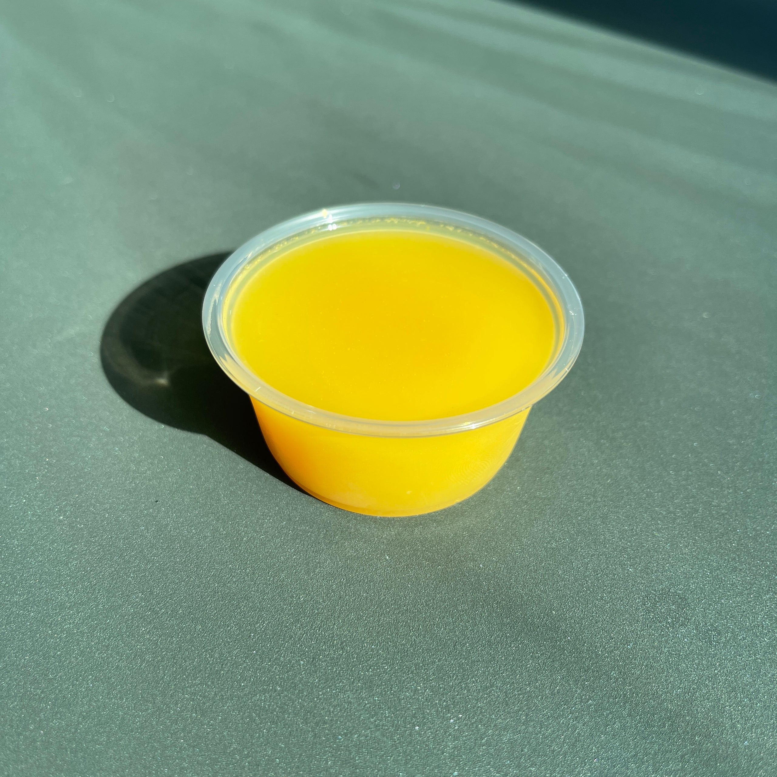 Orange, Grapefruit, Lemon & Ginger Shot Midtown Juice Lab